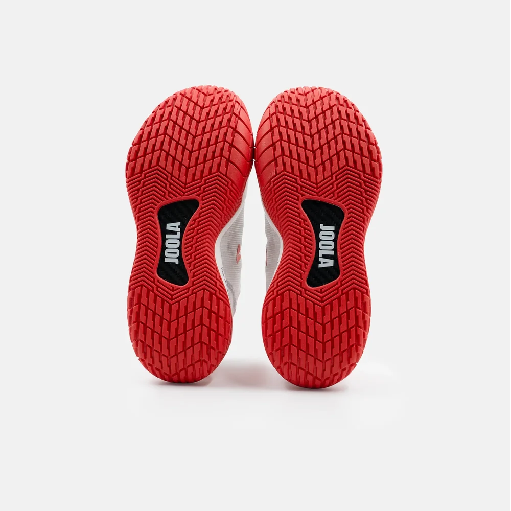 Đế đôi giày JOOLA R4LLy nữ White/Bright Red nhìn thẳng, rãnh vân chữ V sạch
